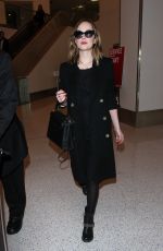 DAKOTA JOHNSON at Los Angeles International Airport 01/26/2016