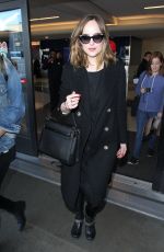 DAKOTA JOHNSON at Los Angeles International Airport 01/26/2016