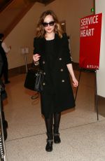 DAKOTA JOHNSON at Los Angeles International Airport 01/26/2016