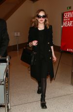 DAKOTA JOHNSON at Los Angeles International Airport 01/26/2016