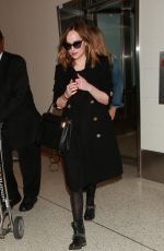DAKOTA JOHNSON at Los Angeles International Airport 01/26/2016