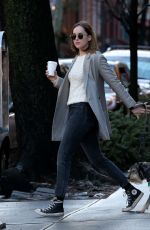 DAKOTA JOHNSON Walks Her Dog Out in New York 01/10/2016