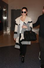 DEMI LOVATO at Los Angeles International Airport 01/20/2016