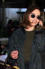 EMILIA CLARKE at LAX Airport in Los Angeles 01/08/2016