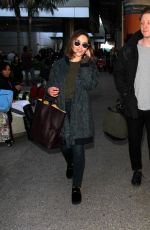 EMILIA CLARKE at LAX Airport in Los Angeles 01/08/2016