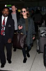EMILIA CLARKE at LAX Airport in Los Angeles 01/08/2016