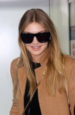 GIGI HADID at Charles De Gaulle Airport in Paris 01/19/2016
