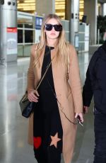 GIGI HADID at Charles De Gaulle Airport in Paris 01/19/2016