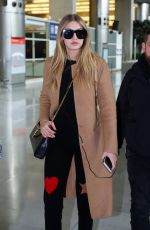 GIGI HADID at Charles De Gaulle Airport in Paris 01/19/2016