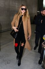 GIGI HADID at Charles De Gaulle Airport in Paris 01/19/2016