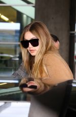 GIGI HADID at Charles De Gaulle Airport in Paris 01/19/2016