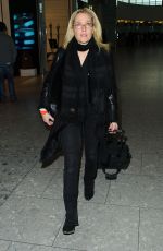 GILLIAN ANDERSON at Heathrow Airport in London 01/08/2016