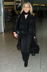 GILLIAN ANDERSON at Heathrow Airport in London 01/08/2016