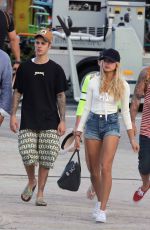 HAILEY BALDWIN Boarding at a Private Jet in St. Barthelemy 01/01/2016