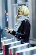HEIDI KLUM at JFK Airport in New York 01/28/2016