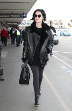 JAIMIE ALEXANDER Arrives at LAX Airport in Los Angeles 01/11/2016