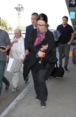 JULIA LOUIS-DREYFUS Arrives at LAX Airport in Los Angeles 01/04/2016
