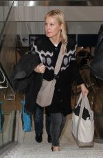 KELLY RUTHERFORD at LAX Airport in Los Angeles 01/21/2016