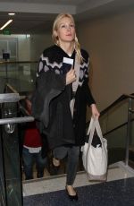 KELLY RUTHERFORD at LAX Airport in Los Angeles 01/21/2016