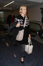 KELLY RUTHERFORD at LAX Airport in Los Angeles 01/21/2016
