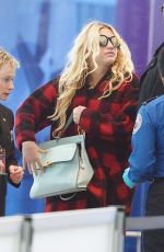 KESHA SEBERT Arrives at JFK Airport in New York 01/27/2016