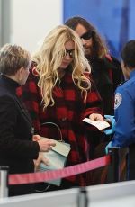 KESHA SEBERT Arrives at JFK Airport in New York 01/27/2016