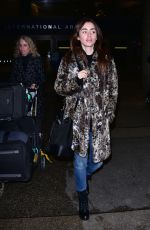 LILY COLLINS Arrives at LAX Airport in Los Angeles 01/06/2016