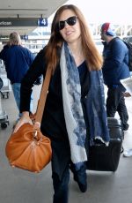 MAGGIE GRACE Arrives at Los Angeles International Airport 01/12/2016