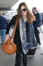 MAGGIE GRACE Arrives at Los Angeles International Airport 01/12/2016