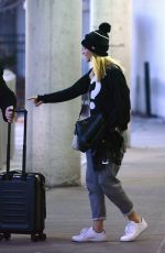 MARGOT ROBBIE Arrives at JFK Airport in New York 01/11/2016