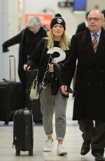 MARGOT ROBBIE Arrives at JFK Airport in New York 01/11/2016