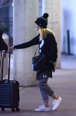 MARGOT ROBBIE Arrives at JFK Airport in New York 01/11/2016