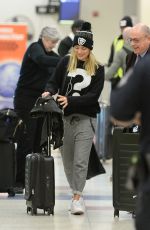 MARGOT ROBBIE Arrives at JFK Airport in New York 01/11/2016