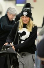 MARGOT ROBBIE Arrives at JFK Airport in New York 01/11/2016