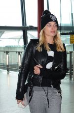 MARGOT ROBBIE at Heathrow Airport in London 01/11/2016