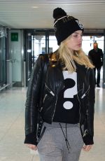MARGOT ROBBIE at Heathrow Airport in London 01/11/2016