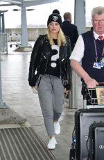MARGOT ROBBIE at Heathrow Airport in London 01/11/2016