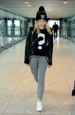MARGOT ROBBIE at Heathrow Airport in London 01/11/2016