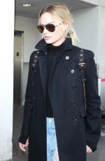 MARGOT ROBBIE at Los Angeles international Airport 01/14/2016