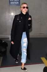MARGOT ROBBIE at Los Angeles international Airport 01/14/2016