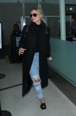 MARGOT ROBBIE at Los Angeles international Airport 01/14/2016