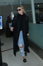MARGOT ROBBIE at Los Angeles international Airport 01/14/2016