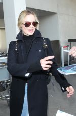 MARGOT ROBBIE at Los Angeles international Airport 01/14/2016