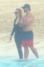 MARIAH CAREY in Wetsuit at a Boat in Caribbean 01/06/2016