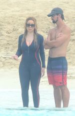 MARIAH CAREY in Wetsuit at a Boat in Caribbean 01/06/2016