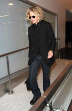 MEG RYAN Arrives at LAX Airport in Los Angeles 01/21/2016