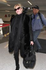 MELANIE GRIFFITH at Los Angeles International Airport 01/19/2016