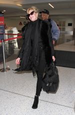 MELANIE GRIFFITH at Los Angeles International Airport 01/19/2016