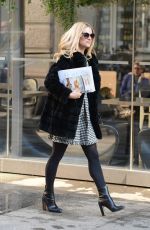 MICHELLE HUNZIKER Out and About in Milan 01/20/2016