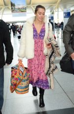MILEY CYRUS Arrives at JFK Airport in New York 01/18/2016